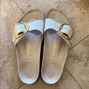 Birkenstock White Metallic Single-Buckle Slide Sandals with Gold Buckles